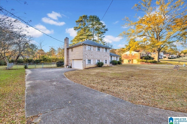 view of property exterior with a garage and a yard