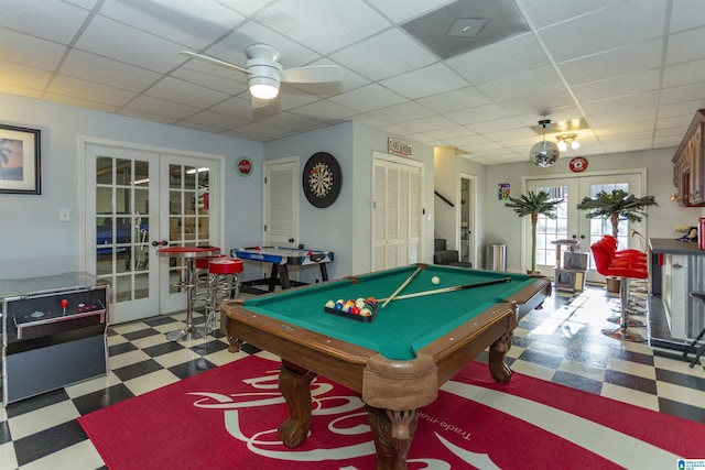 playroom with french doors, a drop ceiling, and billiards