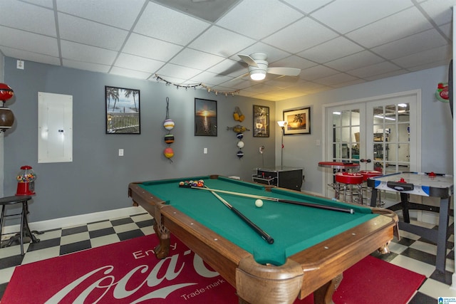 game room featuring a drop ceiling, electric panel, french doors, billiards, and ceiling fan