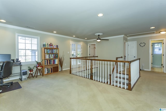 interior space with ceiling fan and ornamental molding