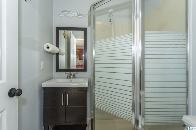 bathroom featuring vanity and walk in shower