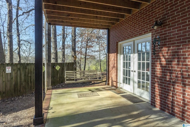 view of patio featuring french doors