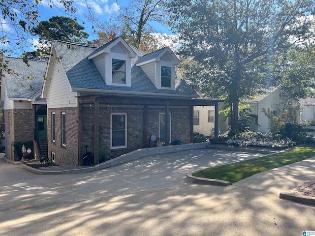 view of new england style home