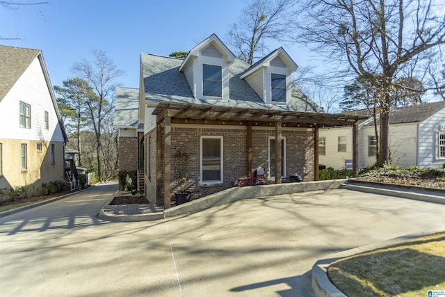 new england style home featuring covered porch