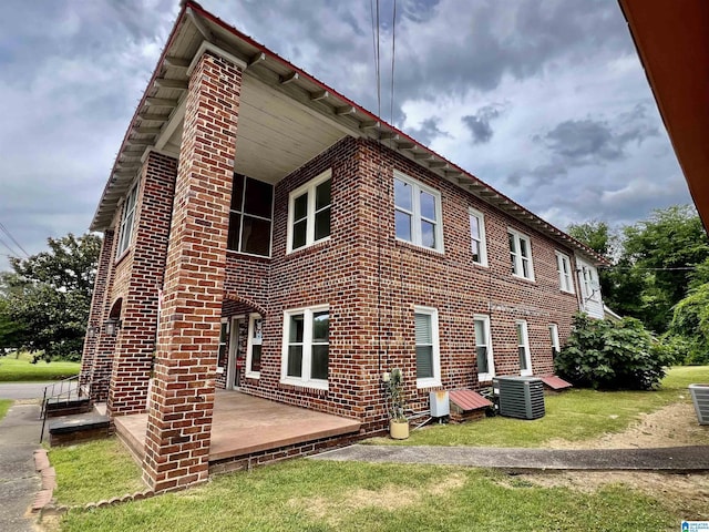 view of home's exterior featuring central AC unit