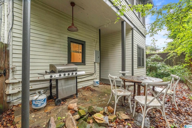 view of patio featuring a grill