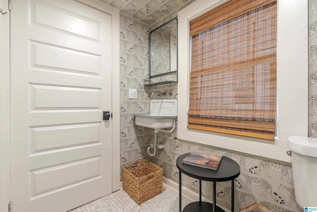 bathroom with tile patterned floors