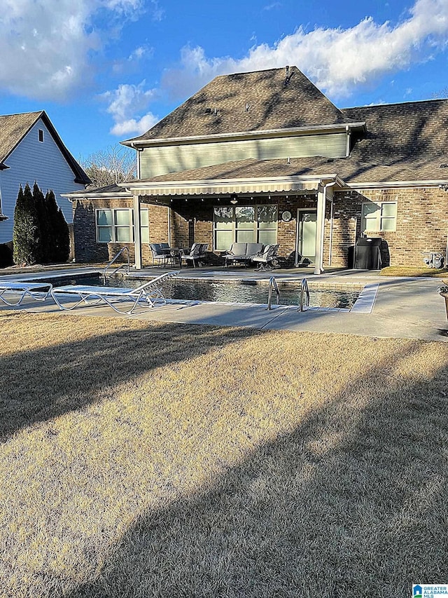 view of home's community featuring an outdoor living space, a swimming pool, and a patio