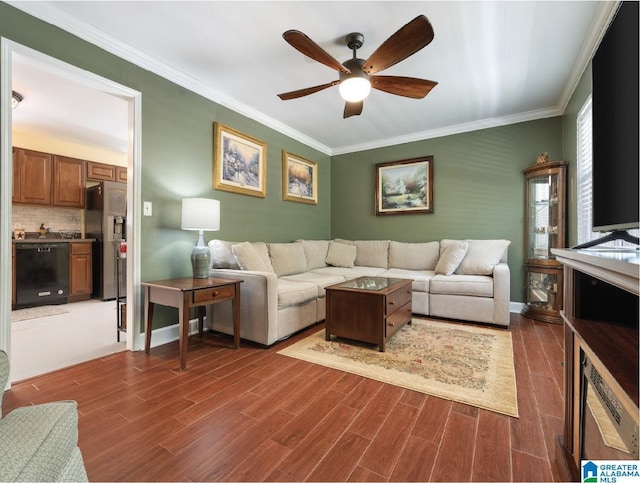 living room featuring ceiling fan, dark hardwood / wood-style floors, and ornamental molding