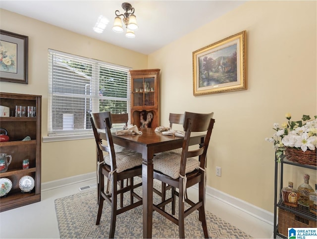 dining area with a chandelier