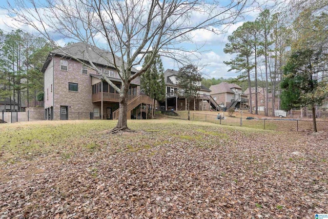 view of yard featuring a wooden deck