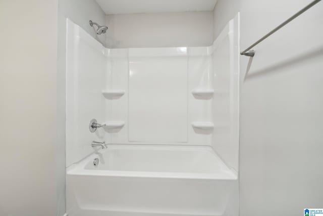 bathroom featuring washtub / shower combination