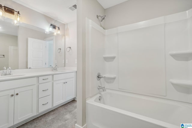 bathroom featuring vanity and shower / washtub combination