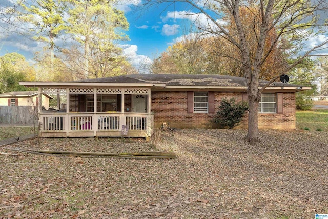 view of front of home with a wooden deck