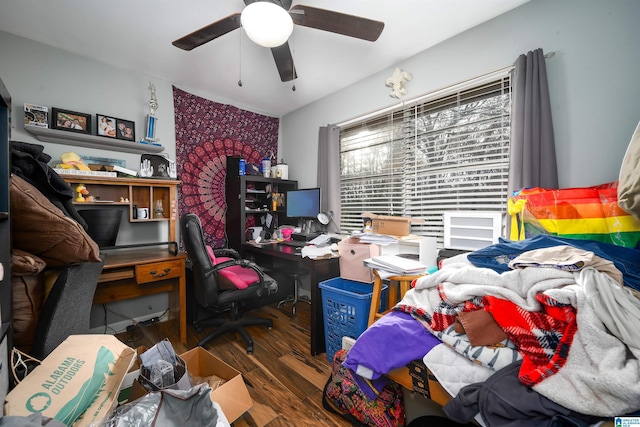 home office with ceiling fan and dark hardwood / wood-style floors