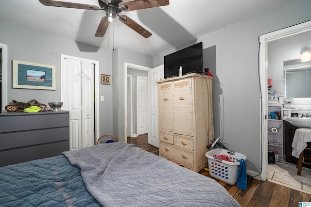 bedroom featuring dark hardwood / wood-style floors and ceiling fan