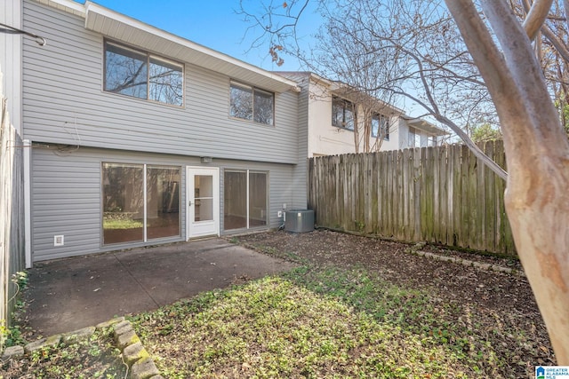 back of house with a patio and central air condition unit