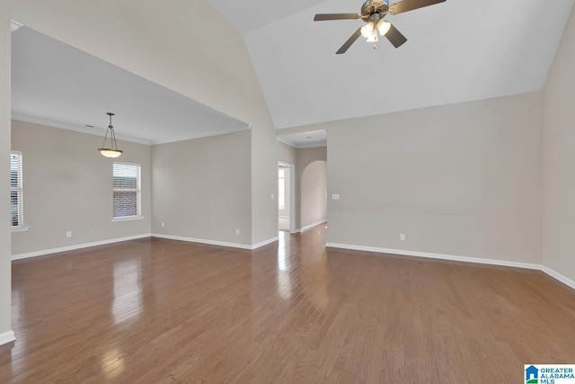 unfurnished living room featuring hardwood / wood-style flooring, ceiling fan, and lofted ceiling