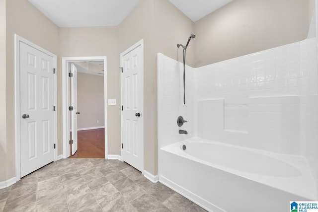 bathroom with shower / tub combination