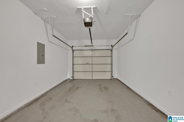 garage with electric panel and a garage door opener