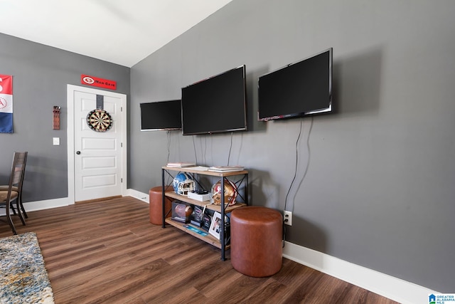 living room with dark hardwood / wood-style floors