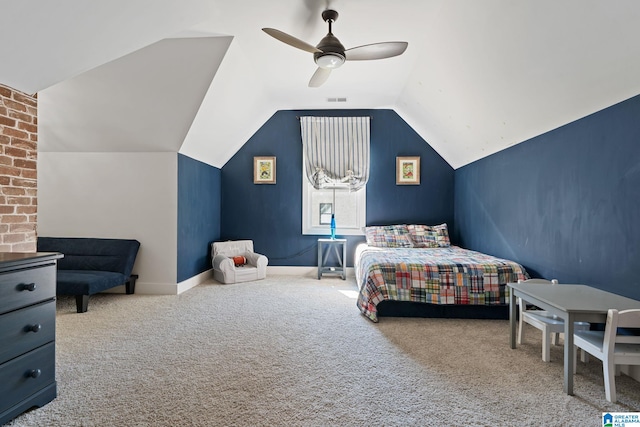 carpeted bedroom featuring ceiling fan and vaulted ceiling