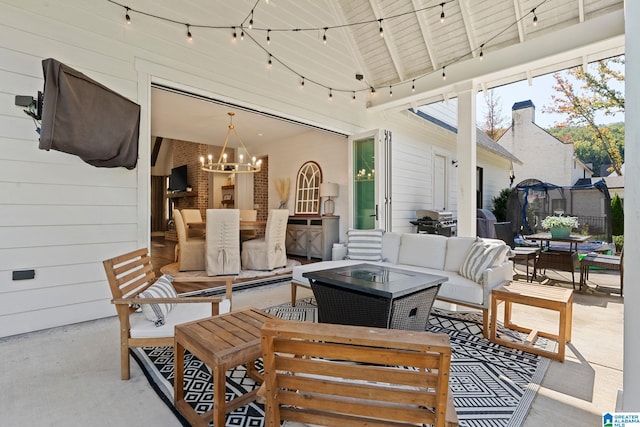 view of patio / terrace with an outdoor living space and a trampoline