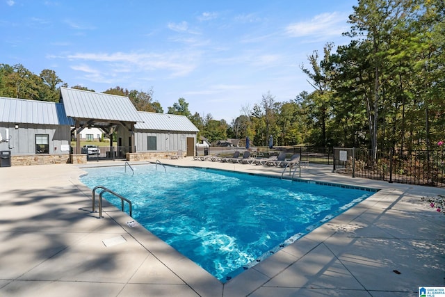 view of pool with a patio