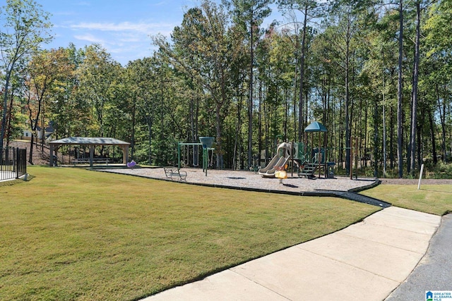 view of home's community with a gazebo, a playground, and a yard