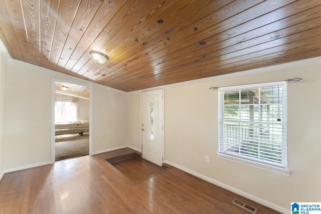 foyer with lofted ceiling, wood-type flooring, and wood ceiling