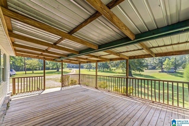 deck featuring a lawn