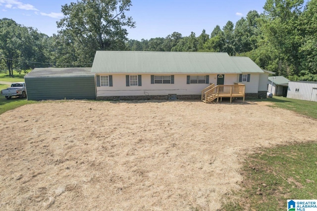 ranch-style house with a deck