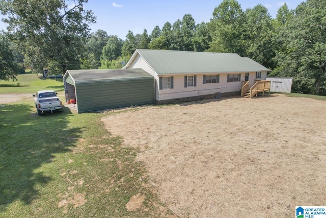 ranch-style house with a front lawn and a carport