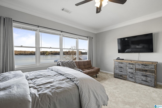 bedroom featuring ceiling fan, light colored carpet, and crown molding