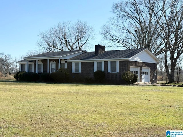 single story home featuring a garage and a front lawn