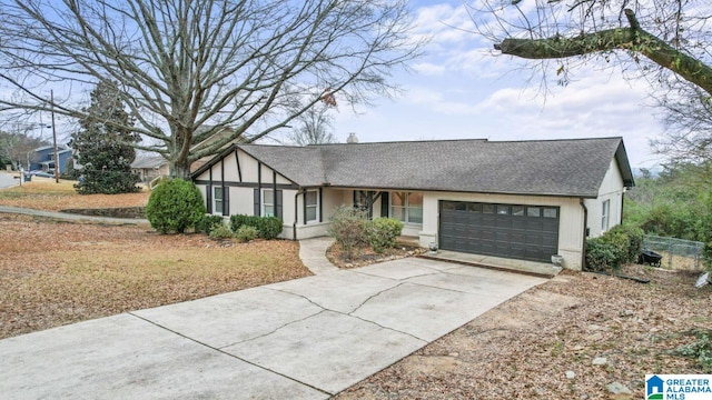 single story home featuring a garage