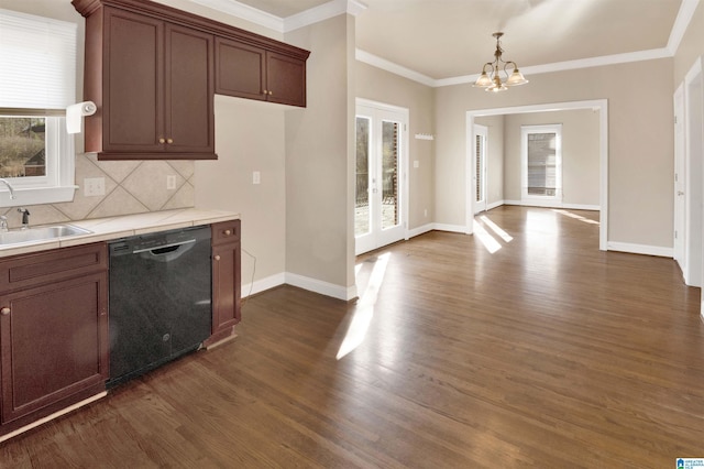 kitchen featuring backsplash, french doors, sink, dark hardwood / wood-style floors, and black dishwasher