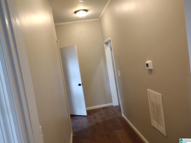 hallway featuring crown molding and dark wood-type flooring