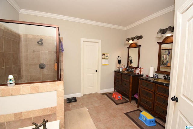 bathroom with tile patterned flooring, vanity, ornamental molding, and tiled shower