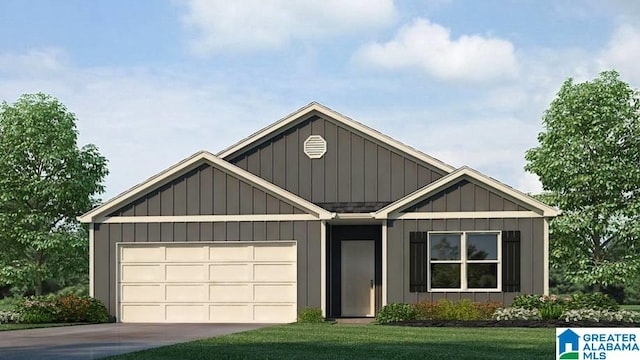 view of front of home with a front yard and a garage