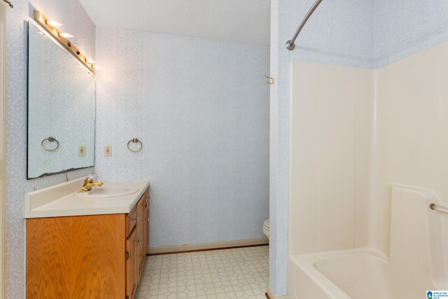 full bathroom with vanity, toilet, and tub / shower combination