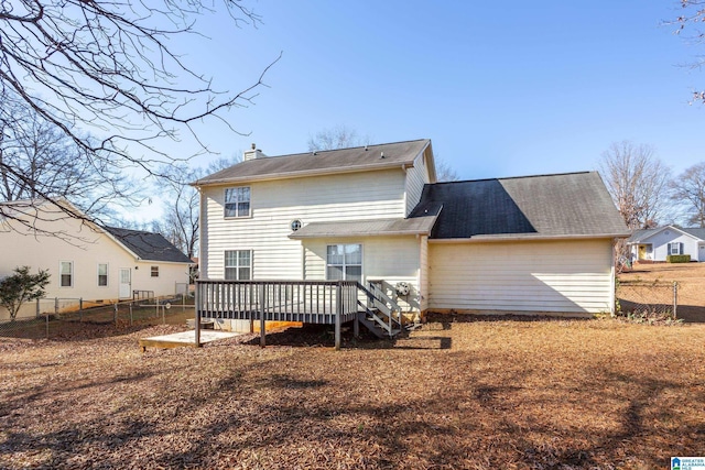 rear view of house with a deck