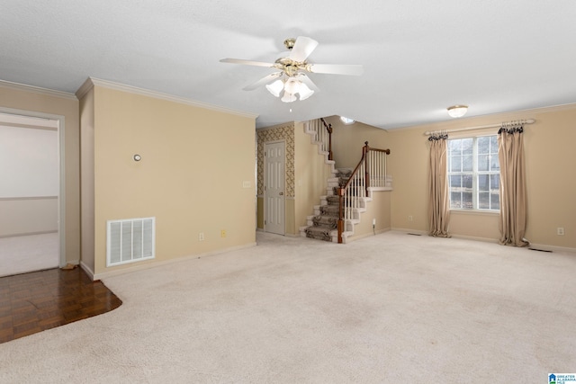 unfurnished room featuring ceiling fan, ornamental molding, and parquet floors