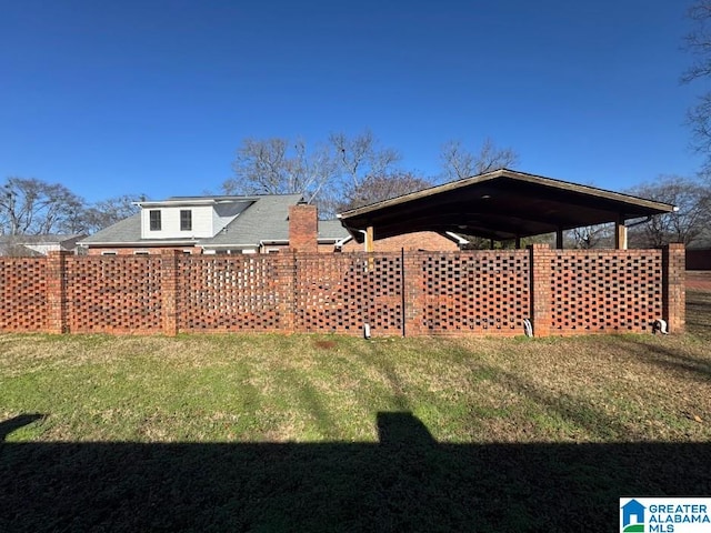 view of yard featuring a carport