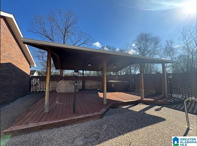 deck with a hot tub