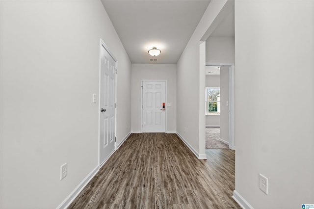 doorway to outside with hardwood / wood-style flooring