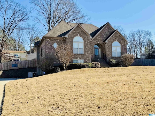 view of front of home with a front yard