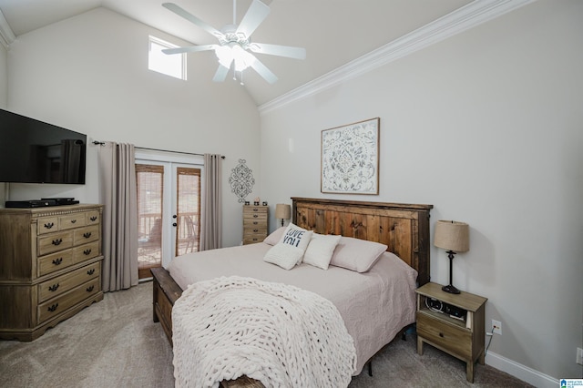 carpeted bedroom with access to exterior, multiple windows, ceiling fan, and ornamental molding