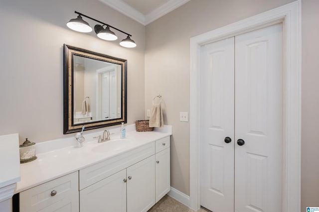 bathroom with vanity and ornamental molding