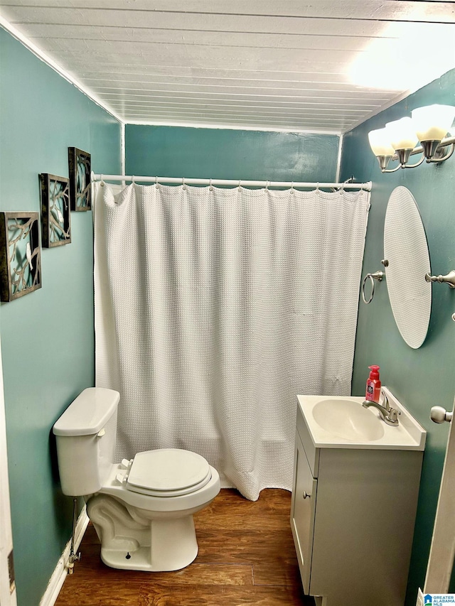 full bathroom featuring vanity, an inviting chandelier, shower / bath combination with curtain, toilet, and wood-type flooring